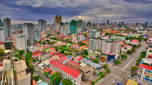 An aerial photo of a medium density urban landscape with vibrate colored buildings.